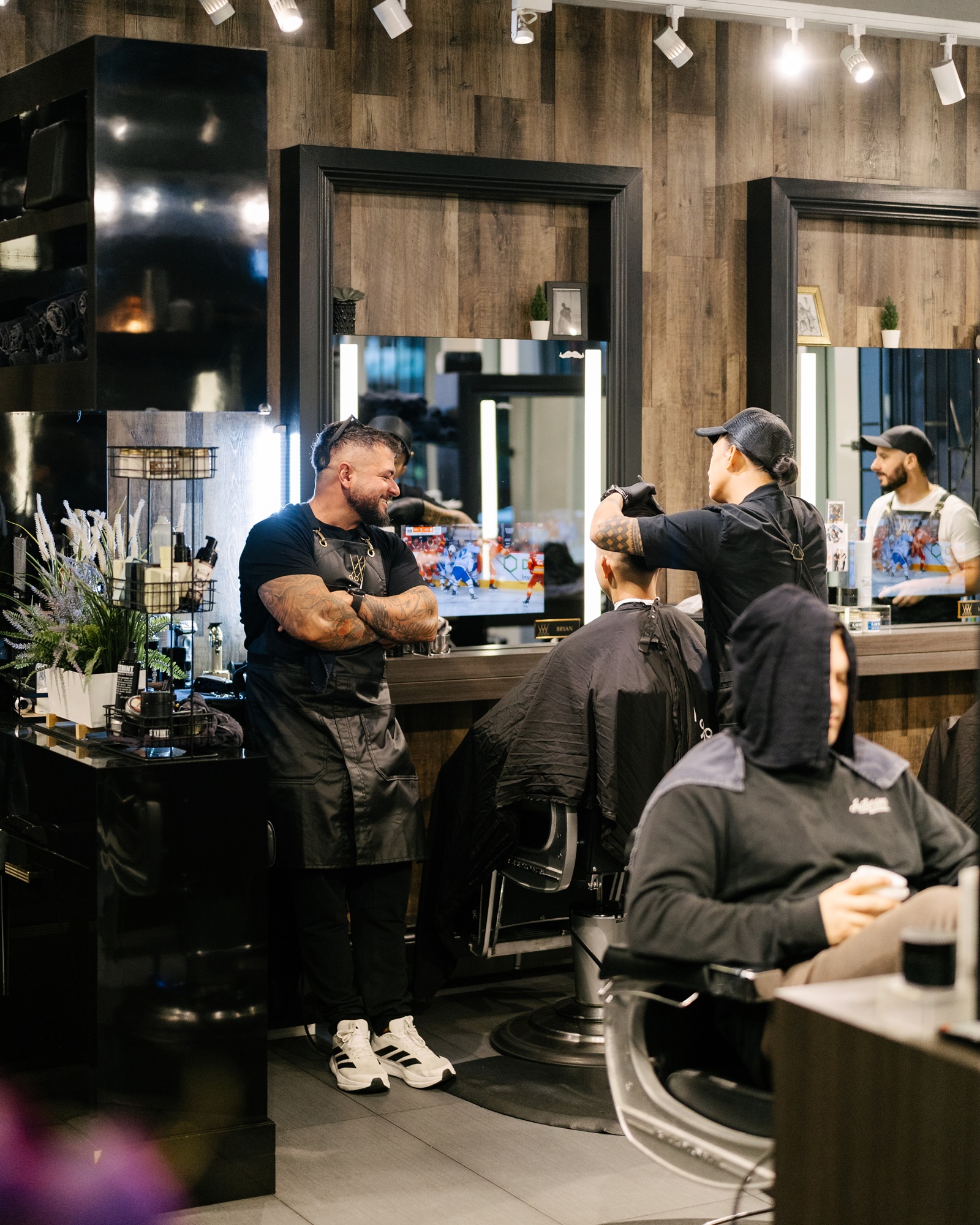 Regal barbers at work in the Vancouver lounge